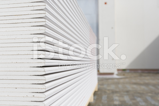 stock-photo-58459208-stack-of-plasterboard-panels - E&H Drylining ...